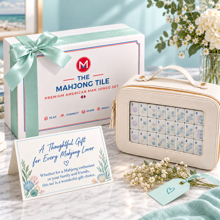 Luxury coastal gift packaging presentation for the large-size Ocean American Mahjong set from the Artistry Collection by The Mahjong Tile, featuring a mint ribbon box, cream case, and gift card.