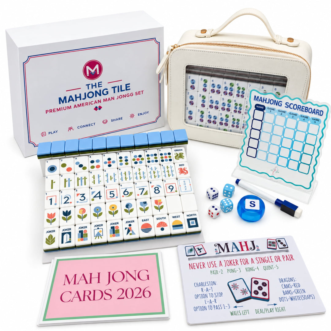 Complete 8-piece gift bundle and packaging details for the Geometric American Mahjong set from the Artistry Collection by The Mahjong Tile, featuring a cream carrying case, retail box, scoreboards, and reading cards