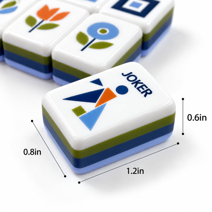 Product dimensions infographic for the Geometric American Mahjong tile from the Artistry Collection by The Mahjong Tile, showing 1.2 x 0.8 x 0.6 inches measurement and blue-green layered acrylic construction.