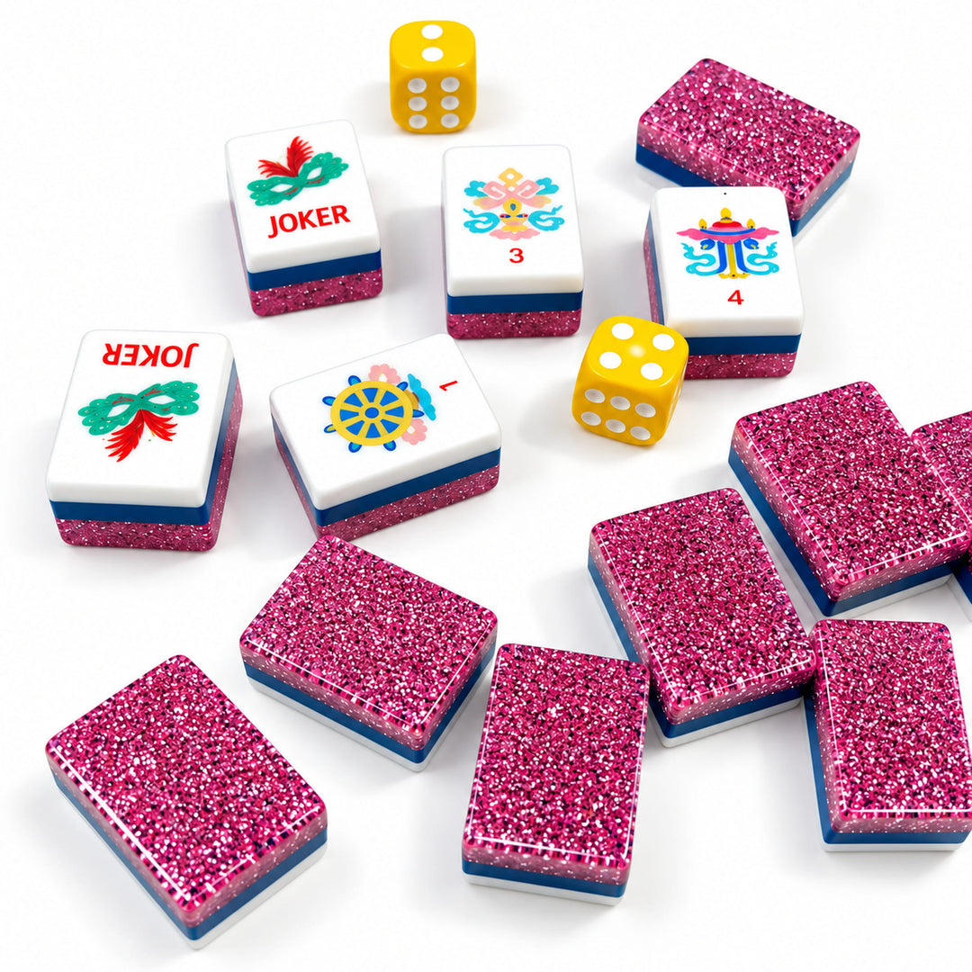 Detailed view of Joker tiles, flower tiles with traditional engravings, and shimmering rose pink glitter tile backs from the Classic Heritage collection by The Mahjong Tile.